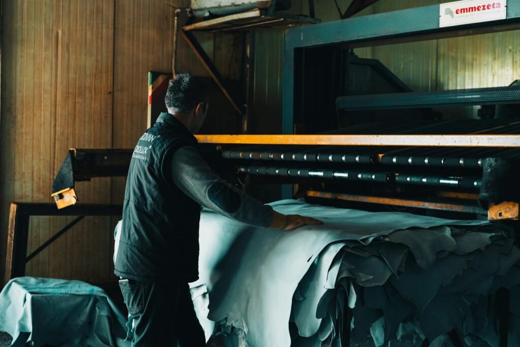 Leathercraft worker processing hides in Gerede tannery, Türkiye.
